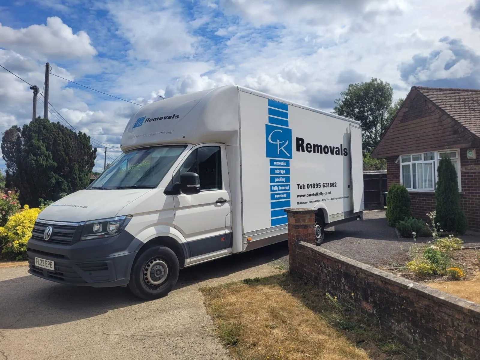 Careful Kelly Removals van outside a home during a residential move