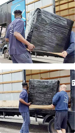 Careful Kelly Removals crew loading a wrapped item into a branded van